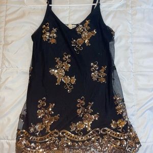 CUTE black strap top with gold accents